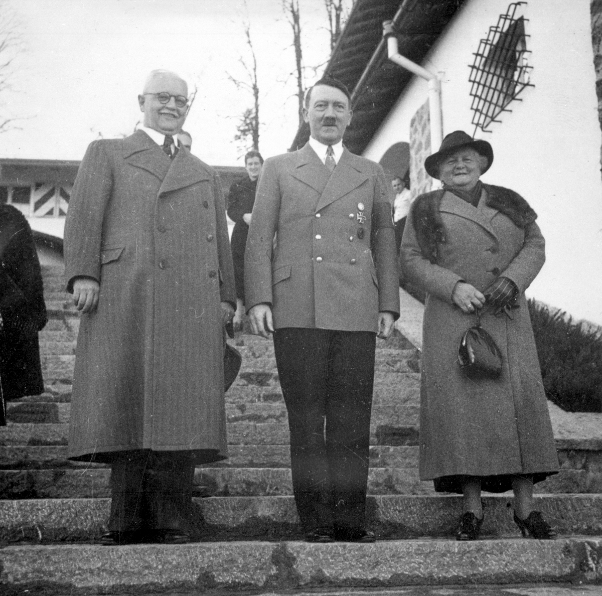 Adolf Hitler welcomes Franz Xaver Schwarz and his wife at the Berghof for his birthday, from Eva Braun's albums
